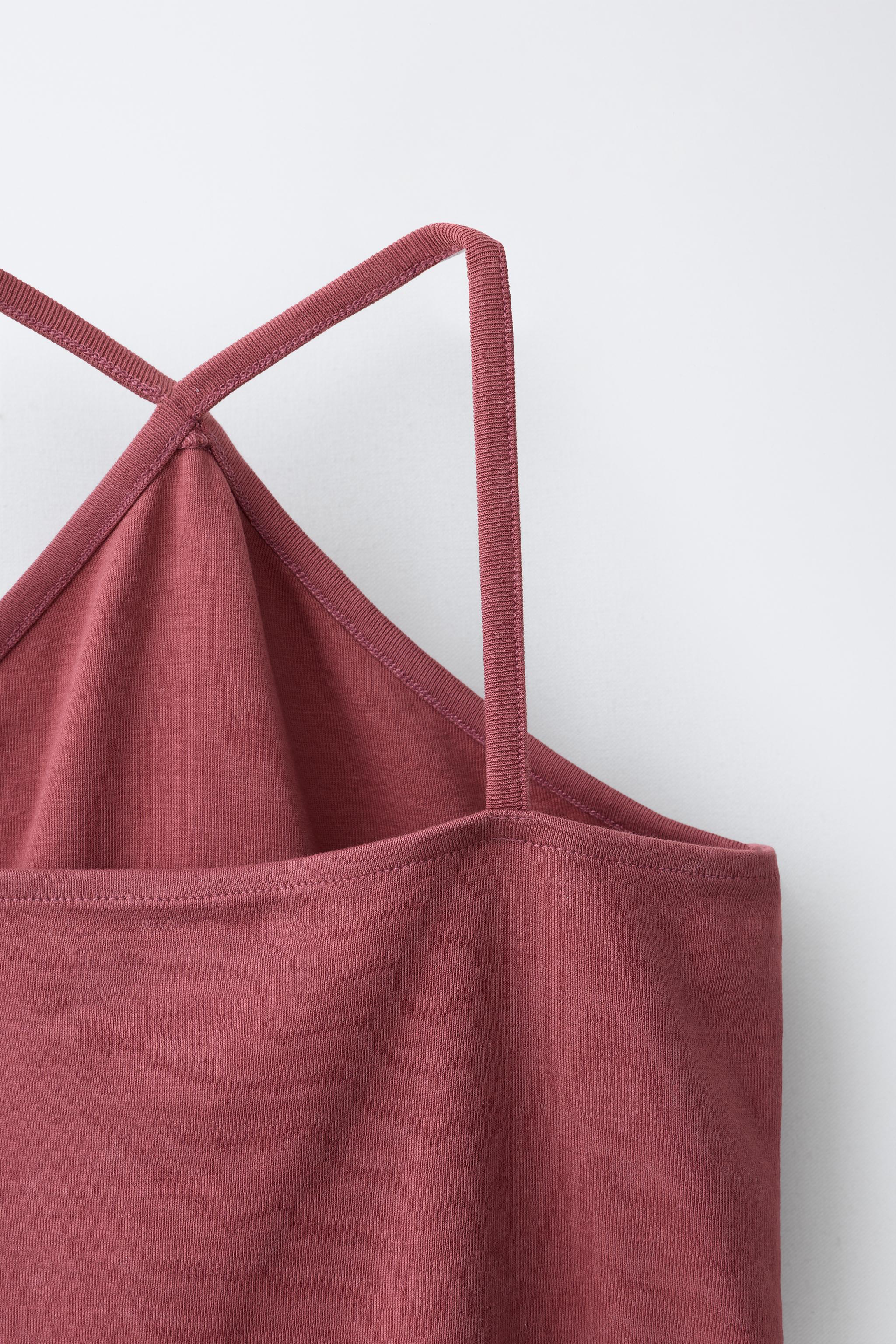 TOP À ENCOLURE HALTER CLOUTÉ